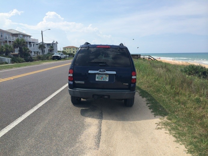 Rear View of Properly Parked Vehicle